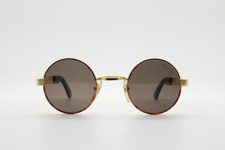 Optical City 90s vintage small round undersized sunglasses made in Italy. Handsome metallic tiger pattern on quality 1920s repro frame. NOS