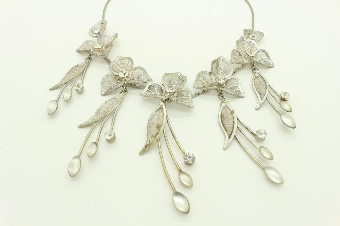90s vintage extensive statement flower chain necklace. Full breasted array of mesh backed petals and dangling leaves with diamante centres