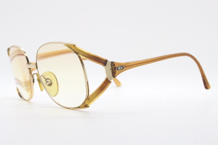 Christian Dior 70s vintage round eyeglasses model 2524 made in Germany from Optyl. Transparent brown optical frame. Prescription eyeglasses