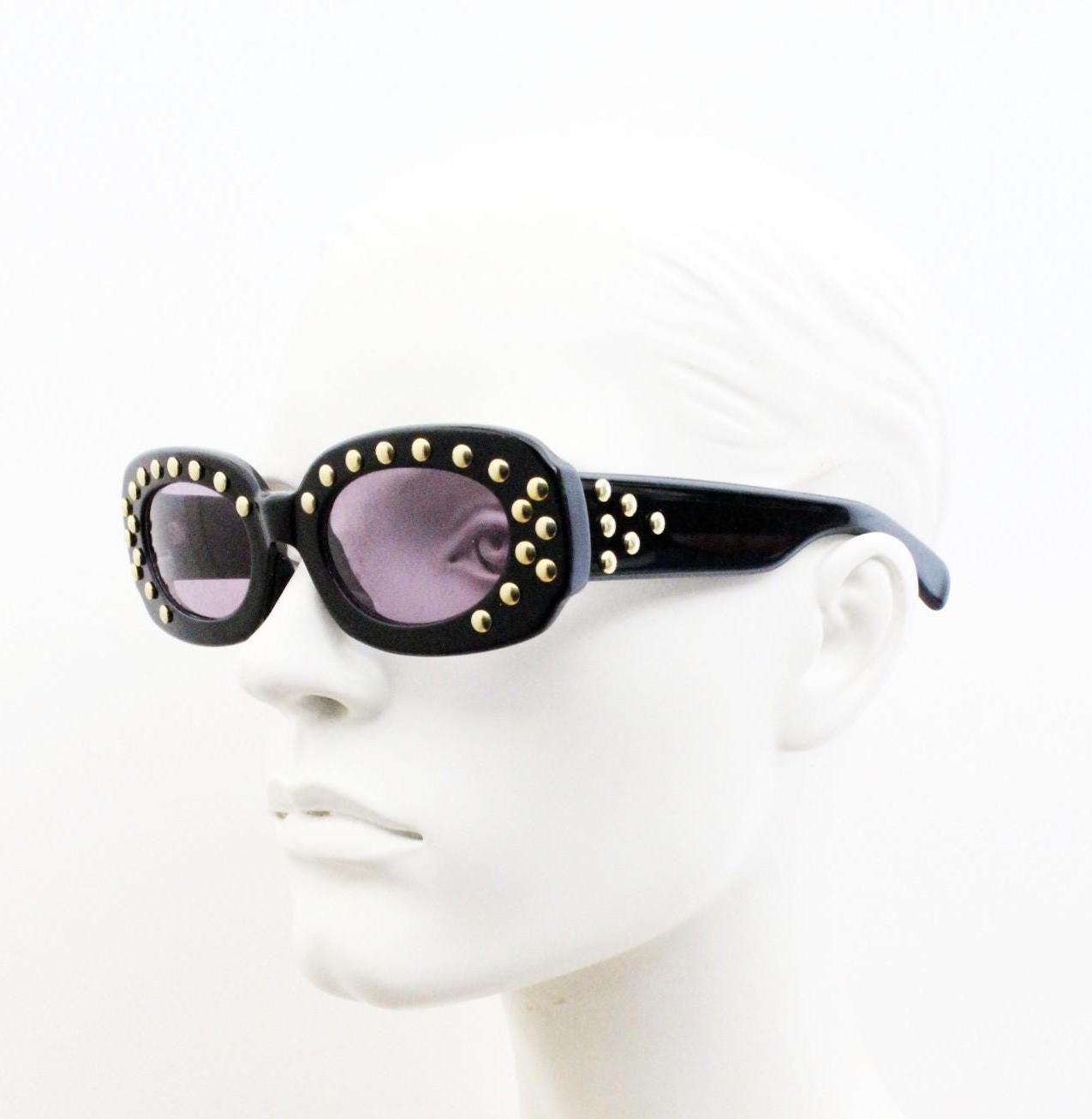 Lanvin vintage thick frame oval sunglasses with large golden dome studs. Womens 60s shape black acetate frame with atmospheric purple lenses