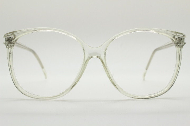 80s vintage oversized round cat eye glasses. Transparent clear crystal optical frame. Prescription RX spectacles. Clean NOS cateye