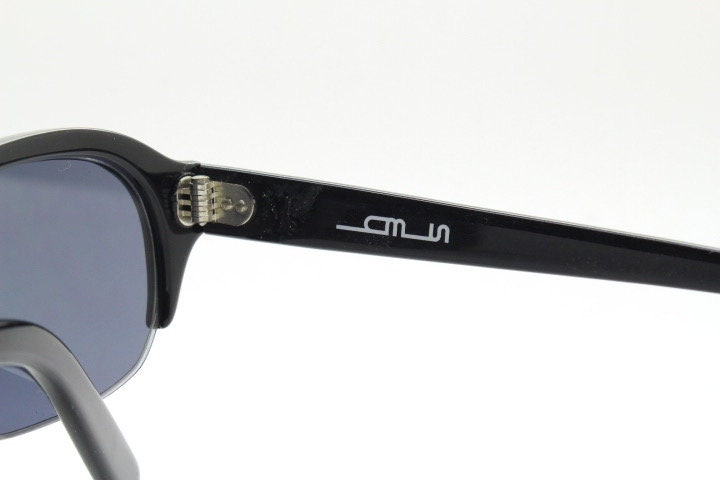 Stylised vintage oval praying mantis cateye sunglasses made in Japan. Superior Japanese black gloss acetate half frame bug eye