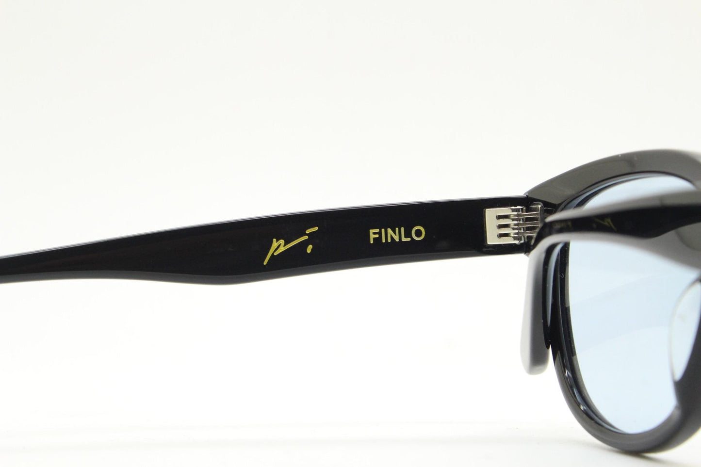 Vintage modified wayfarer design sunglasses. Black gloss acetate frame with extra light tone blue lenses in ideal proportions. NOS