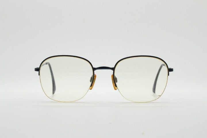 Giorgio Armani round eye glasses made in Italy. Minimal black satin finish half frame spectacles. Prescription optical eyeglasses. RX