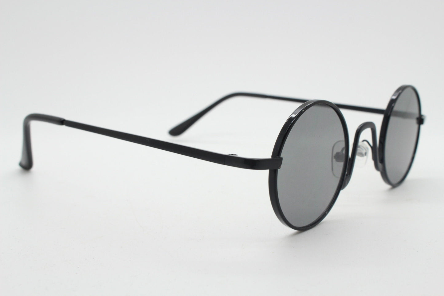 90s vintage small oval sunglasses. Imposing minimal black victorian style frame with dark grey lenses. Steampunk. Unused BNWT