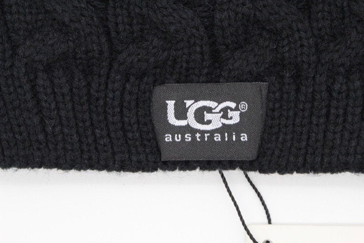Ugg Australia plain black knitted beanie hat. Aran pattern weave with ribbed edge. Pull down cap. BNWT