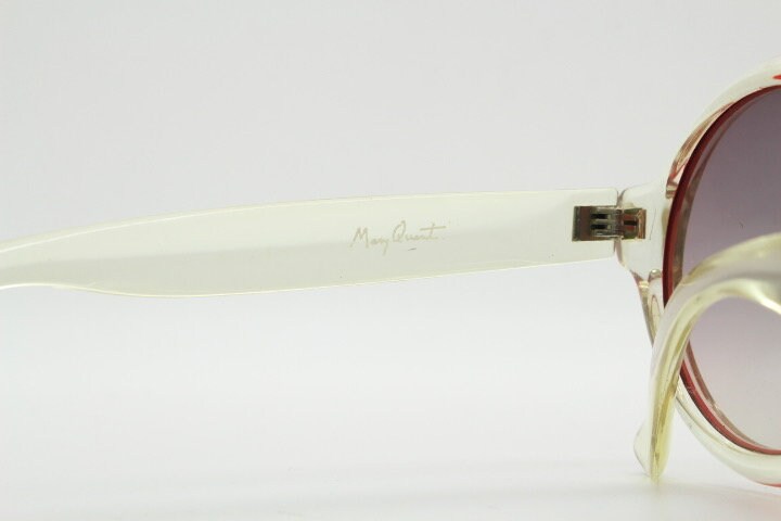 Mary Quant 60s vintage round sunglasses made in France. Yellow crystal transparent lucite frame in with contrasting dark graduating lenses