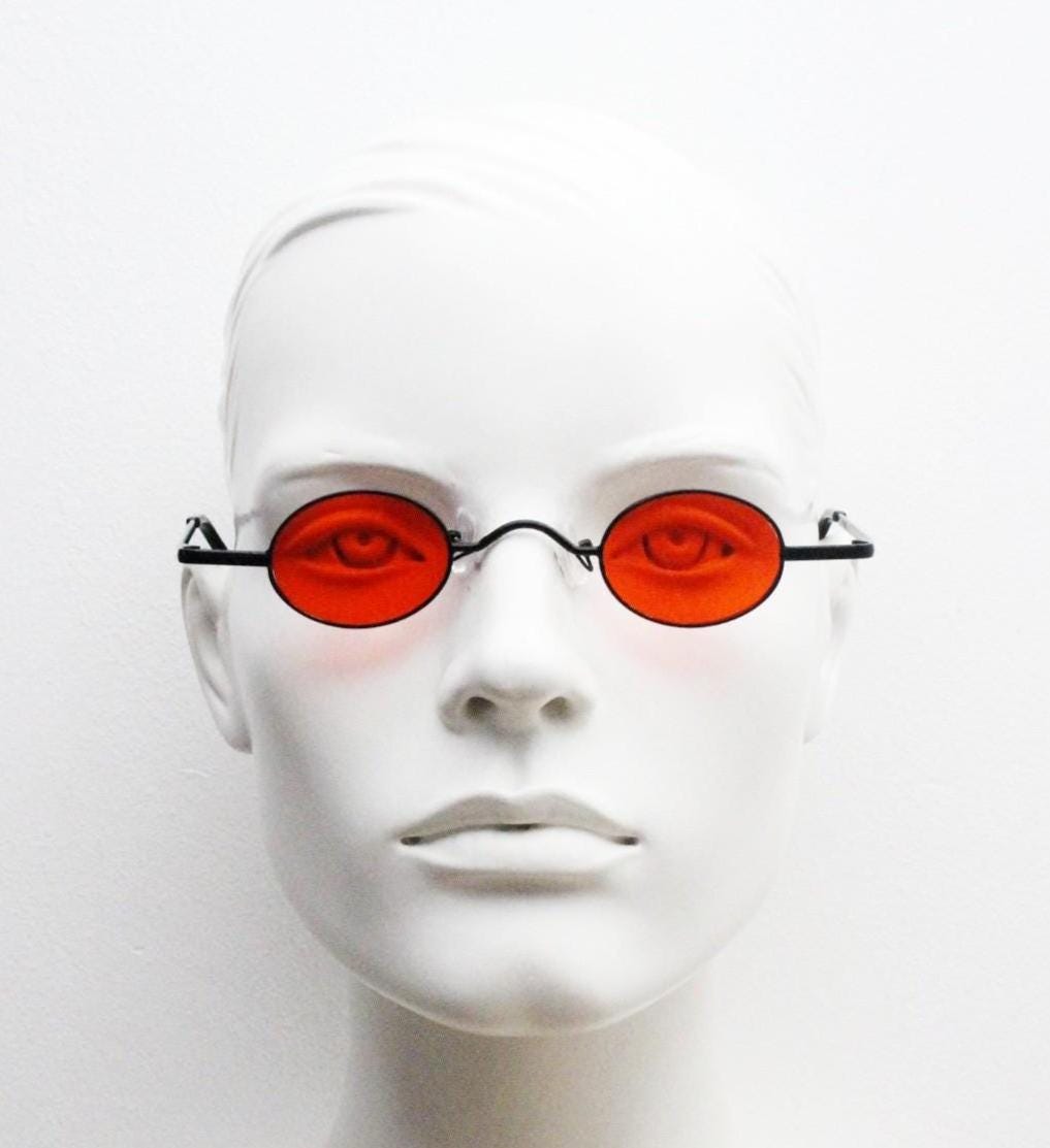 90s vintage small oval sunglasses. Imposing minimal black gloss metal victorian antique style frame with bright red lenses. Steampunk. NOS