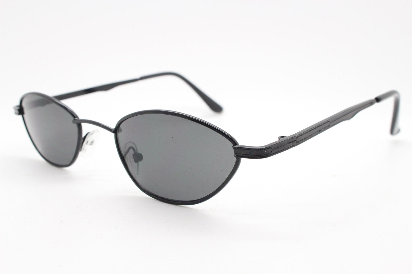 90s vintage low profile sunglasses. Minimal small black angular oval metal frame with matching lenses, Unused. BNWT