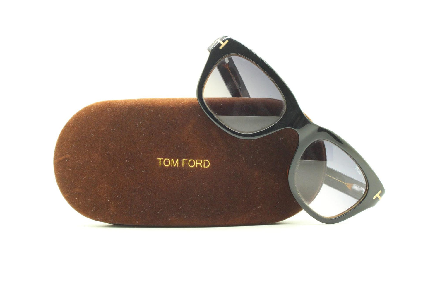 Tom Ford vintage modified wayfarer sunglasses made in Italy. Slightly cat eye form in black gloss acetate with superb graduating lenses