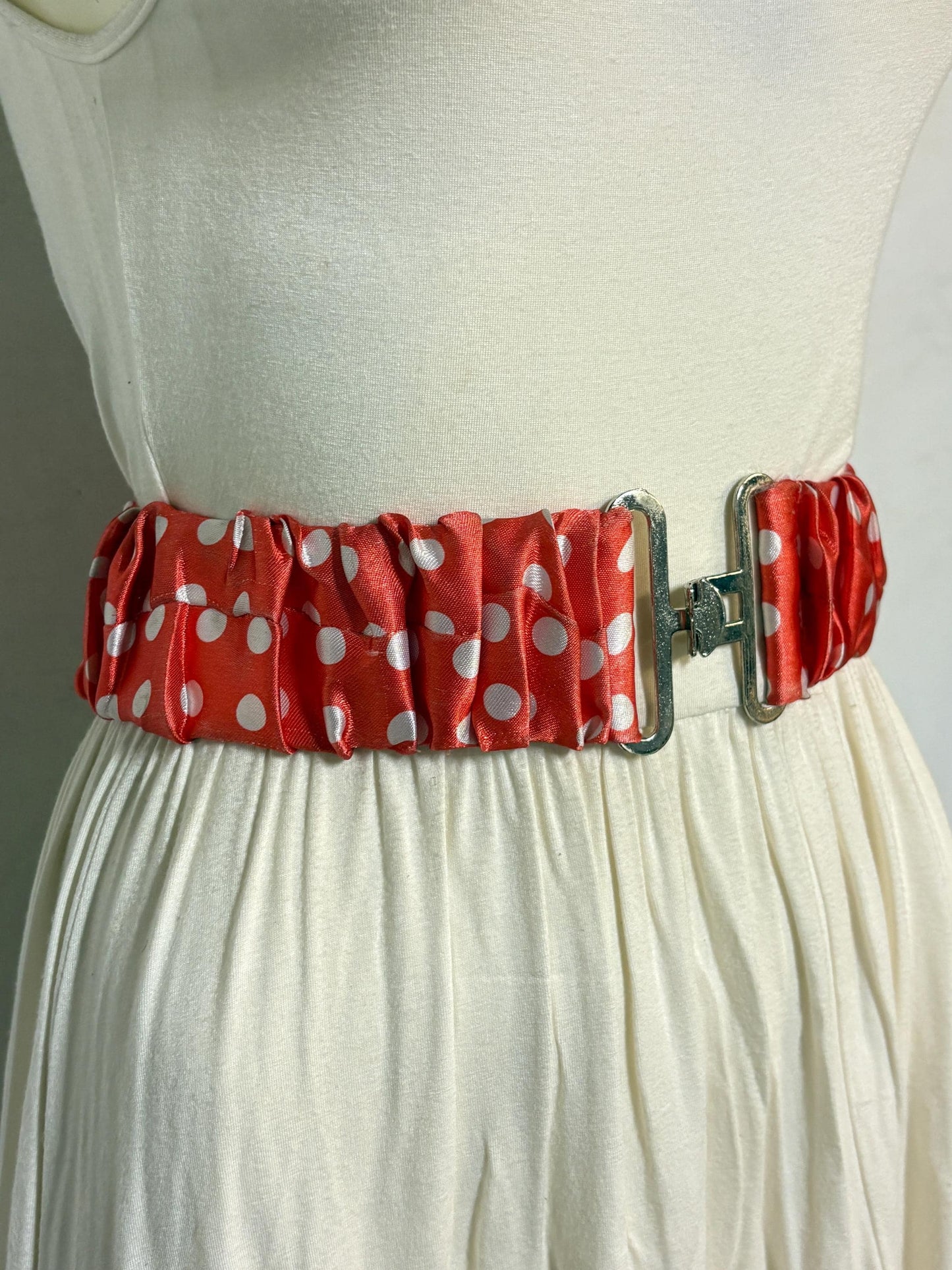 80s vintage womens elastic red with big white polka dots stretch belt. Flattering cinch for a dress. Chrome buckle. Minnie mouse cosplay