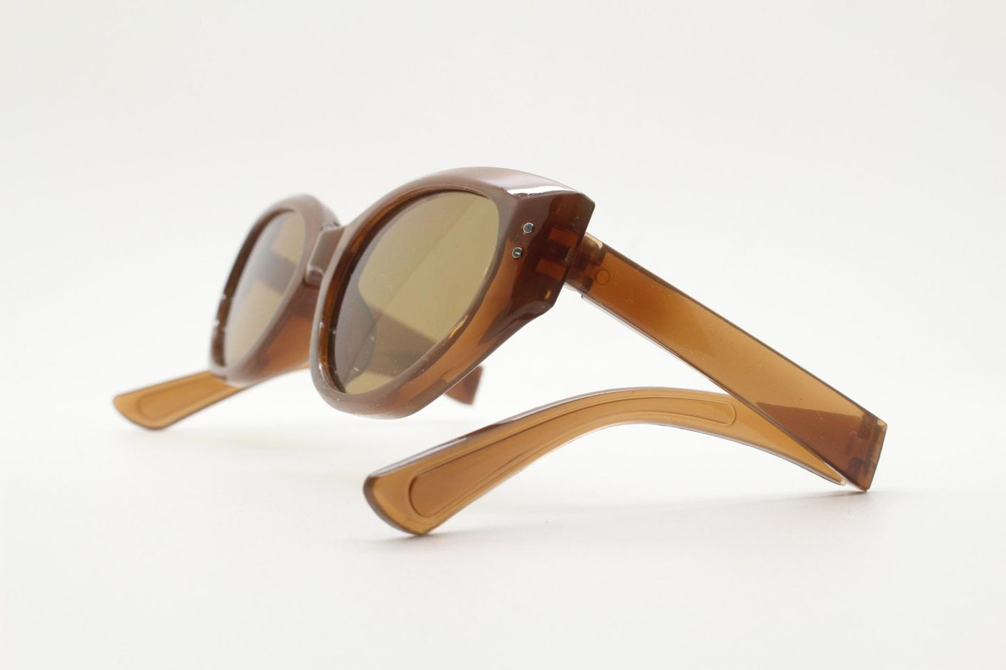 Vintage foldable cat eye sunglasses. Transparent brown folding compact cateye frame. Neat and clever folder design. Y2K NOS