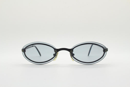 90s vintage small oval sunglasses. Minimal black metal frame with clever overlapping lens design in light tone grey. Micro. Steampunk. NOS