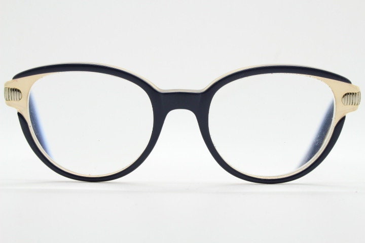 Nina Ricci vintage cat eye glasses. Yellow crystal and black acetate cateye optical frames gold metal arms. Womens prescription spectacles