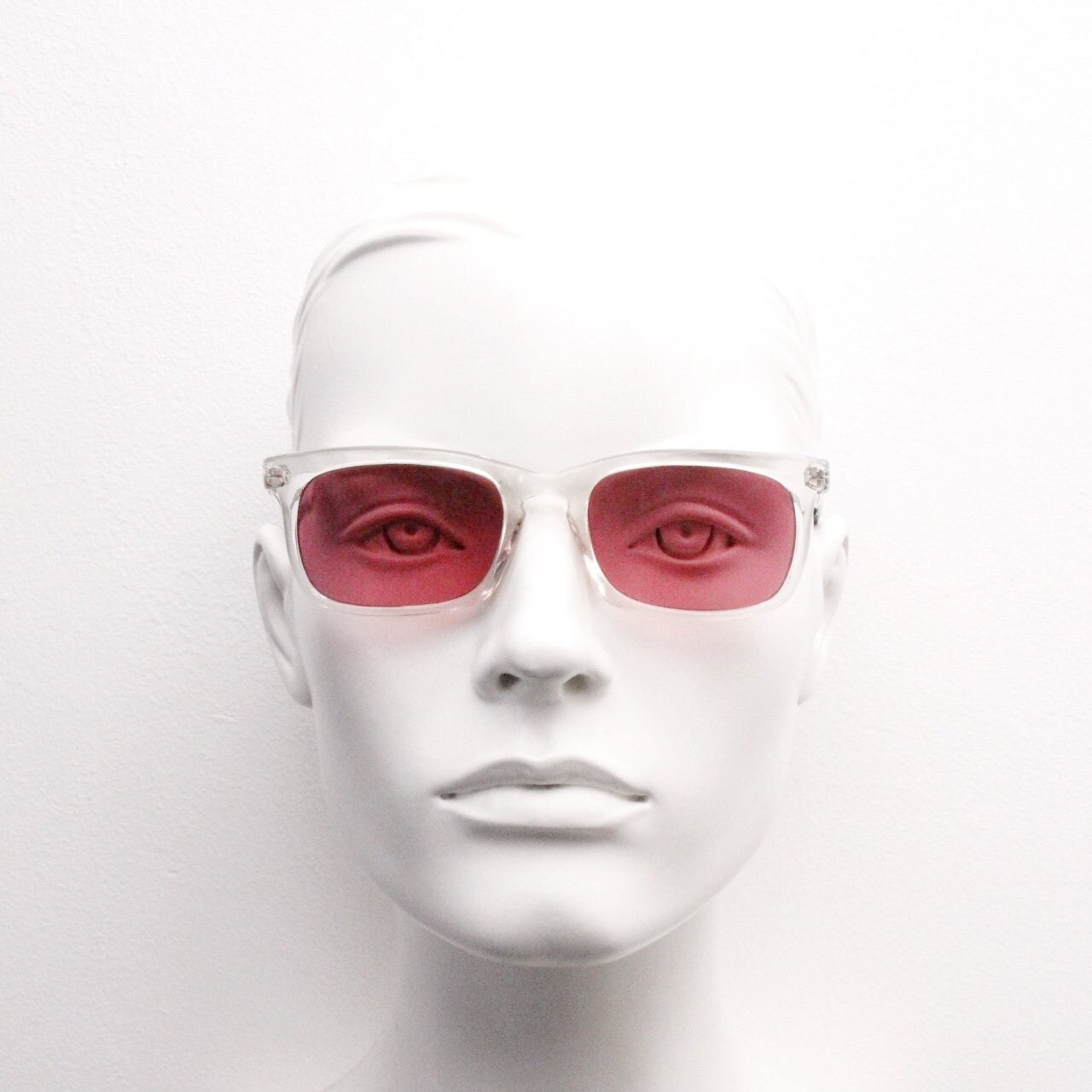 90s vintage futuristic crystal  sunglasses. Rectangular transparent frame with extraordinary arm cut outs and shocking pink lenses. NOS