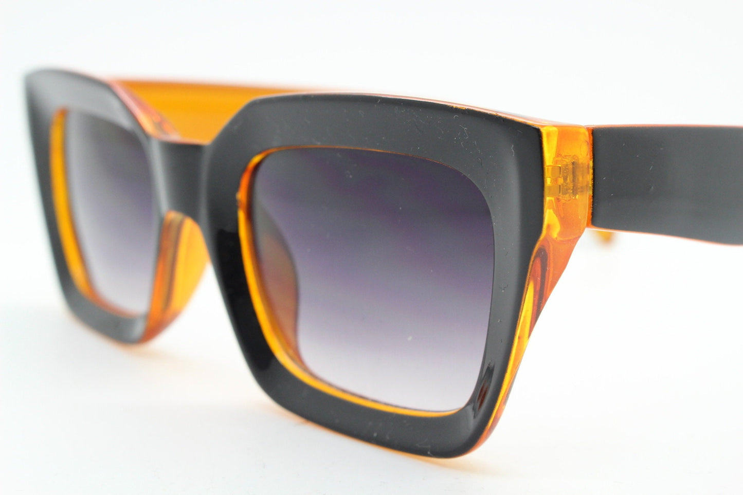 Y2K vintage rectangular cat eye sunglasses. Women's thick black and orange 60s style frame with graduating smoky lenses. 2000s BNWT
