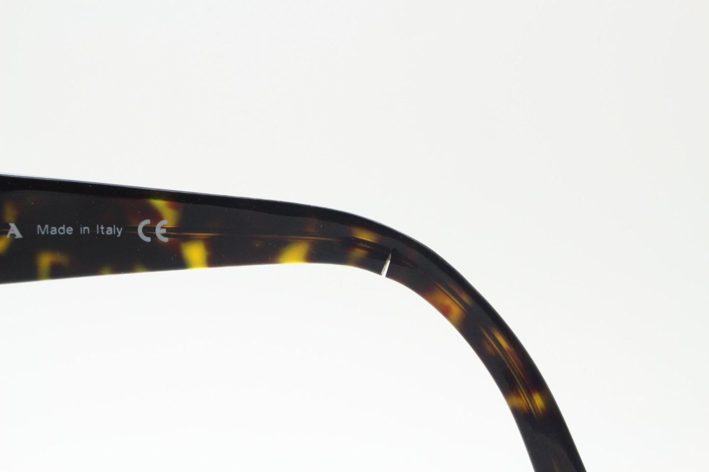 Prada rectangular wrap around eyeglasses made in Italy. Tortoise curving acetate optical frame with tall arms. Vintage prescription glasses