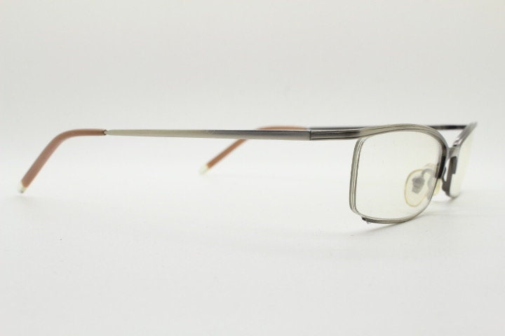 Slazenger 90s vintage rectangular eye glasses. Minimal low profile tech style optical frame in satin finish pewter look. Prescription RX