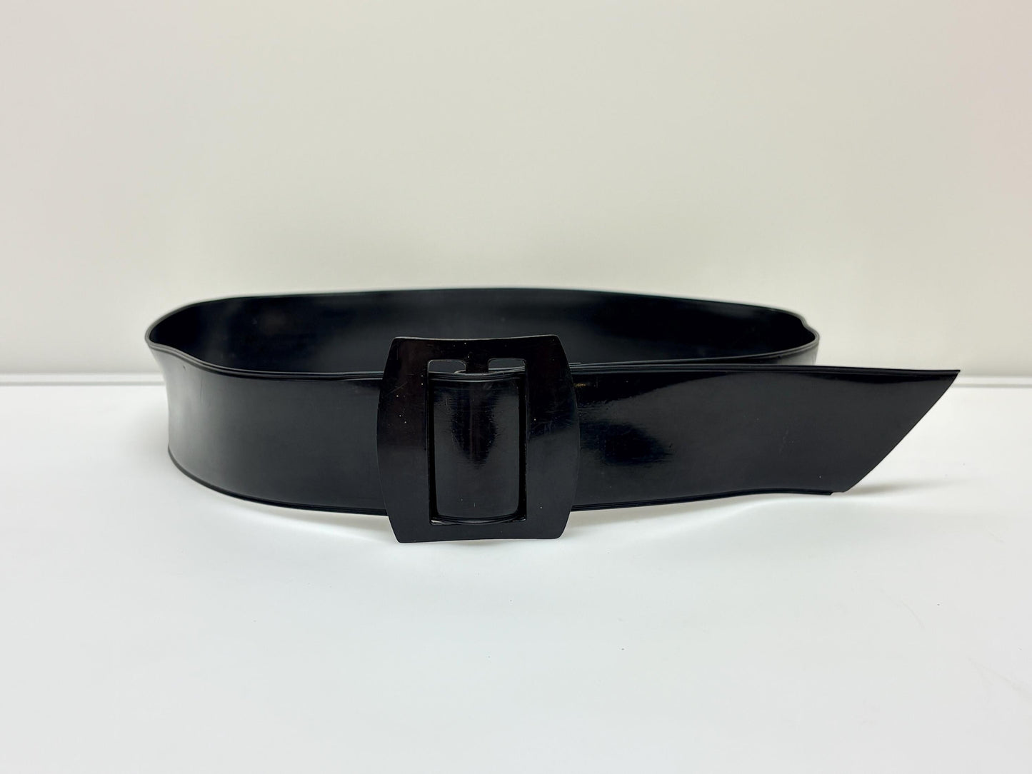 80s vintage womens shiny fetish 2" dress belt. All black seamless vinyl with well matched flat buckle. 50s kinky pin up bad girl
