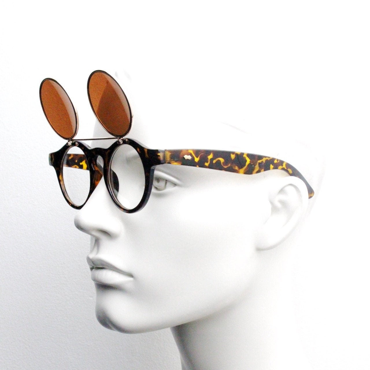 Vintage 90s round flipper sunglasses. 30s style tortoise frame with clear lenses and flip up sunglasses visor. BNWT unused