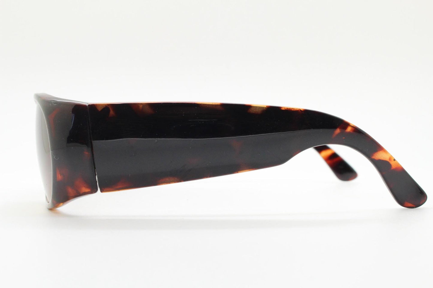 Y2k vintage wrap around bug eye sunglasses. Aerodynamic 60s design tortoise frame with full height arms in excellent proportions. 2000's NOS