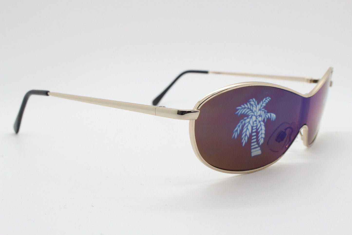 Party monster Y2K vintage visor sunglasses. Wraparound mono lens mini mask shield design with mind melting palm tree print. Unused NOS