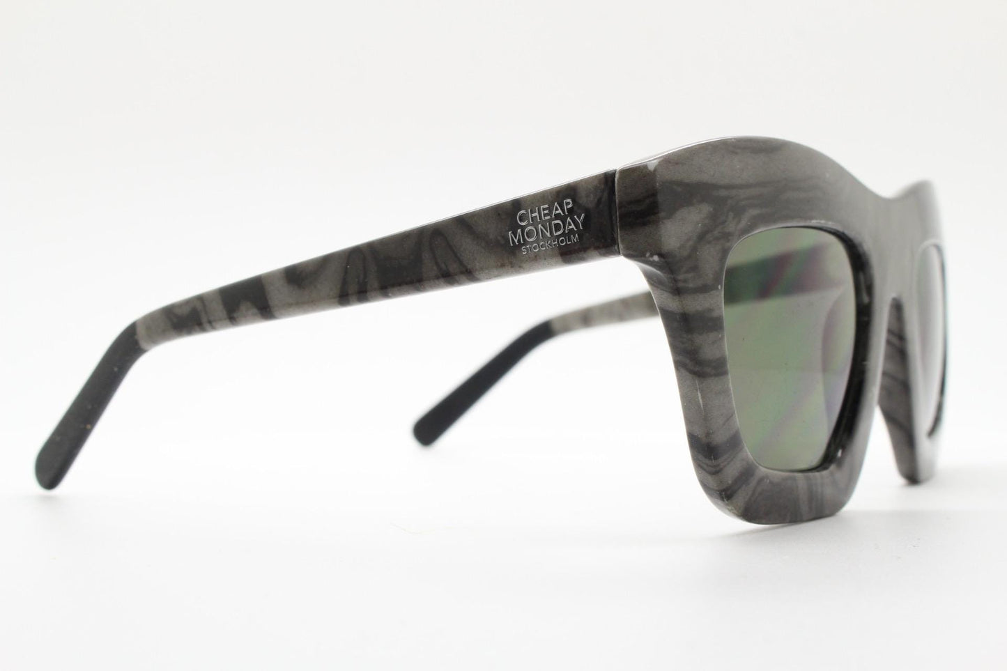 Cheap Monday thick frame cateye sunglasses. Womens chunky oversized grey and black marble cat eye with dark green lenses. Y2k vintage