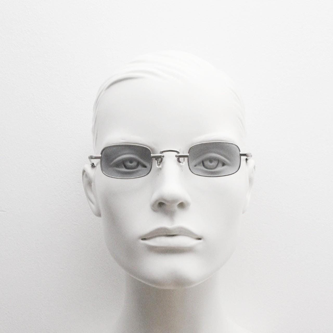 90s vintage small rectangular sunglasses. Imposing minimal silver victorian style frame with grey lenses. Steampunk. Unused NOS
