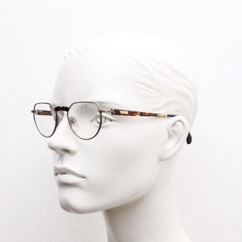 Silhouette vintage 90s flat top oval eye glasses made in Austria. Satin bronze optical frame with honey tortoise trim. Prescription RX