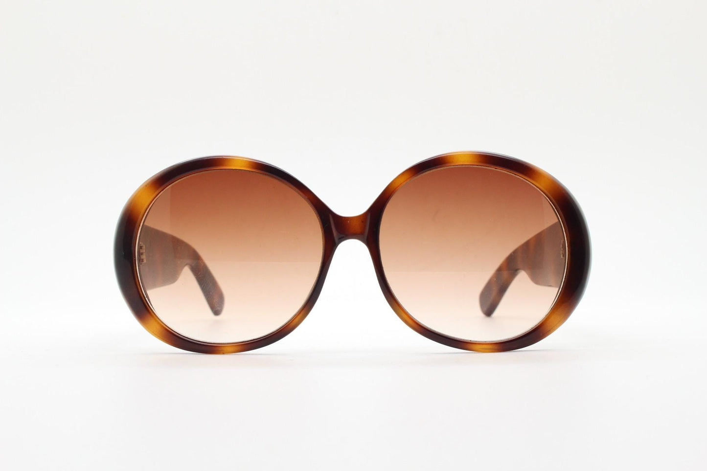 90s vintage round sunglasses. 60s style thick honey tortoise frame with graduating lenses and amber diamantes. Rhinestone. Unused NOS