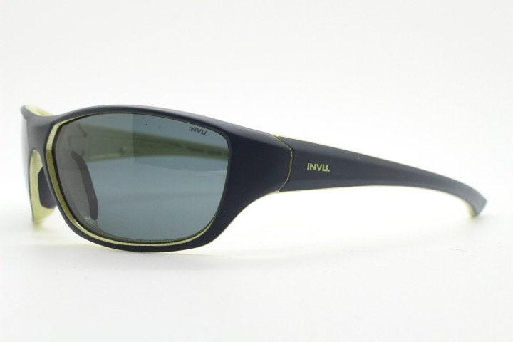 Y2K vintage sport shield sunglasses. All matt black wraparound aerodynamic visor with light green outline. 2000's. 90s. Unused NOS