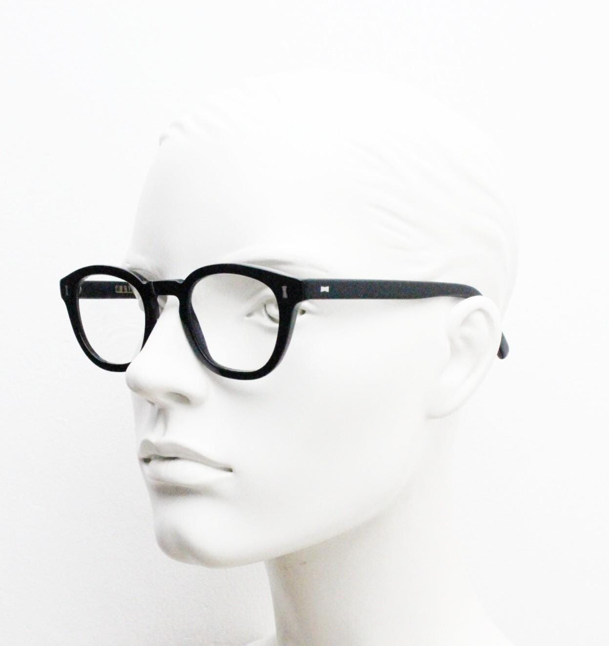 Cubitts vintage round 40s design Moreland eye glasses. Plain black gloss acetate optical frame with keyhole bridge. Prescription RX