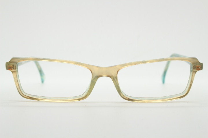 Alain Mikli rectangular eye glasses hand made in France. Low profile slim peach and blue transparent acetate optical frame. Prescription RX.