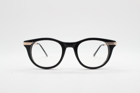 90s vintage cat eye glasses in black with gold metal arms. 50s, 60s style cateye prescription optical frames. Clear lens eyeglasses. RX