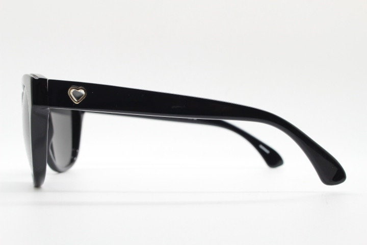 Linda Farrow Collaborations sunglasses with LUELLA. Limited production black acetate chunky wayfarer design with heart crests. NOS vintage
