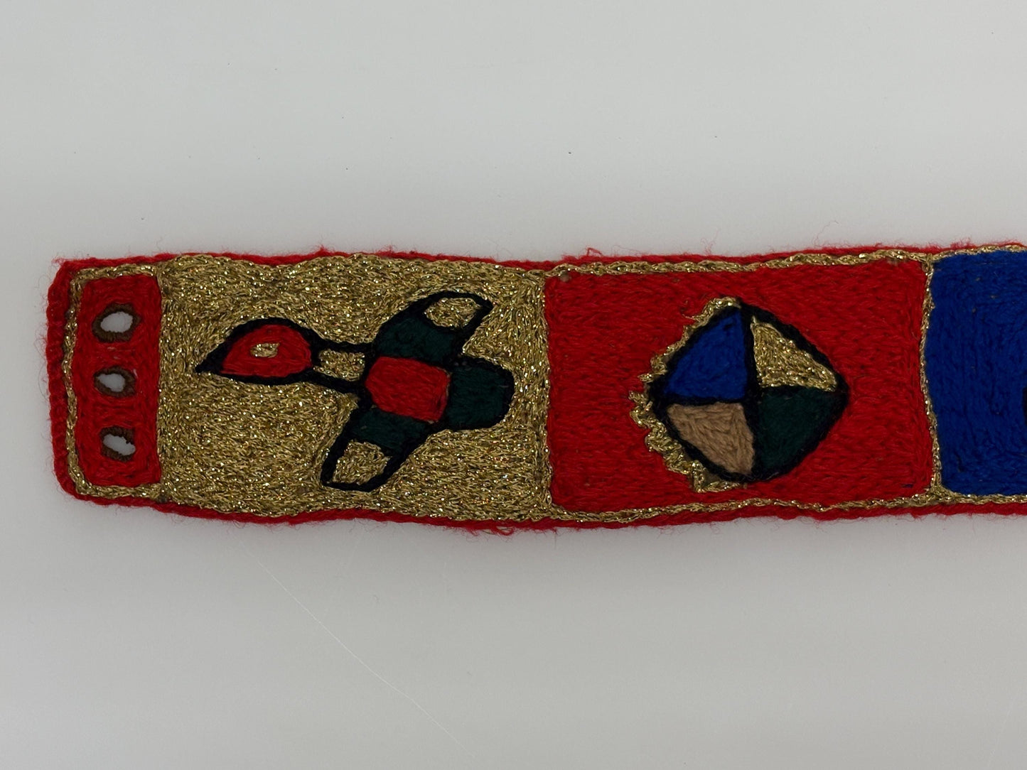 60s vintage completely hand made knitted belt. Embroidered sun, bird and abstract symbols with leather laced tie. Womens unique one off