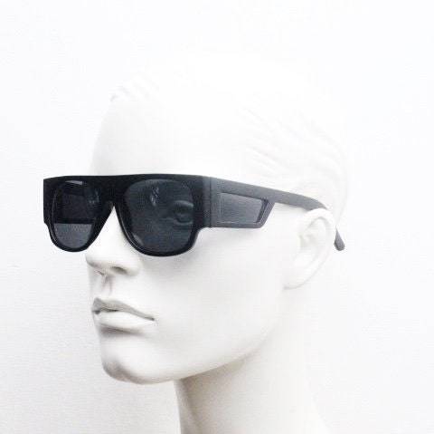 Y2K vintage rectangular side panel sunglasses. Black matt frame with grey lenses and side window spoilers / blinkers. 2000s NOS goggle