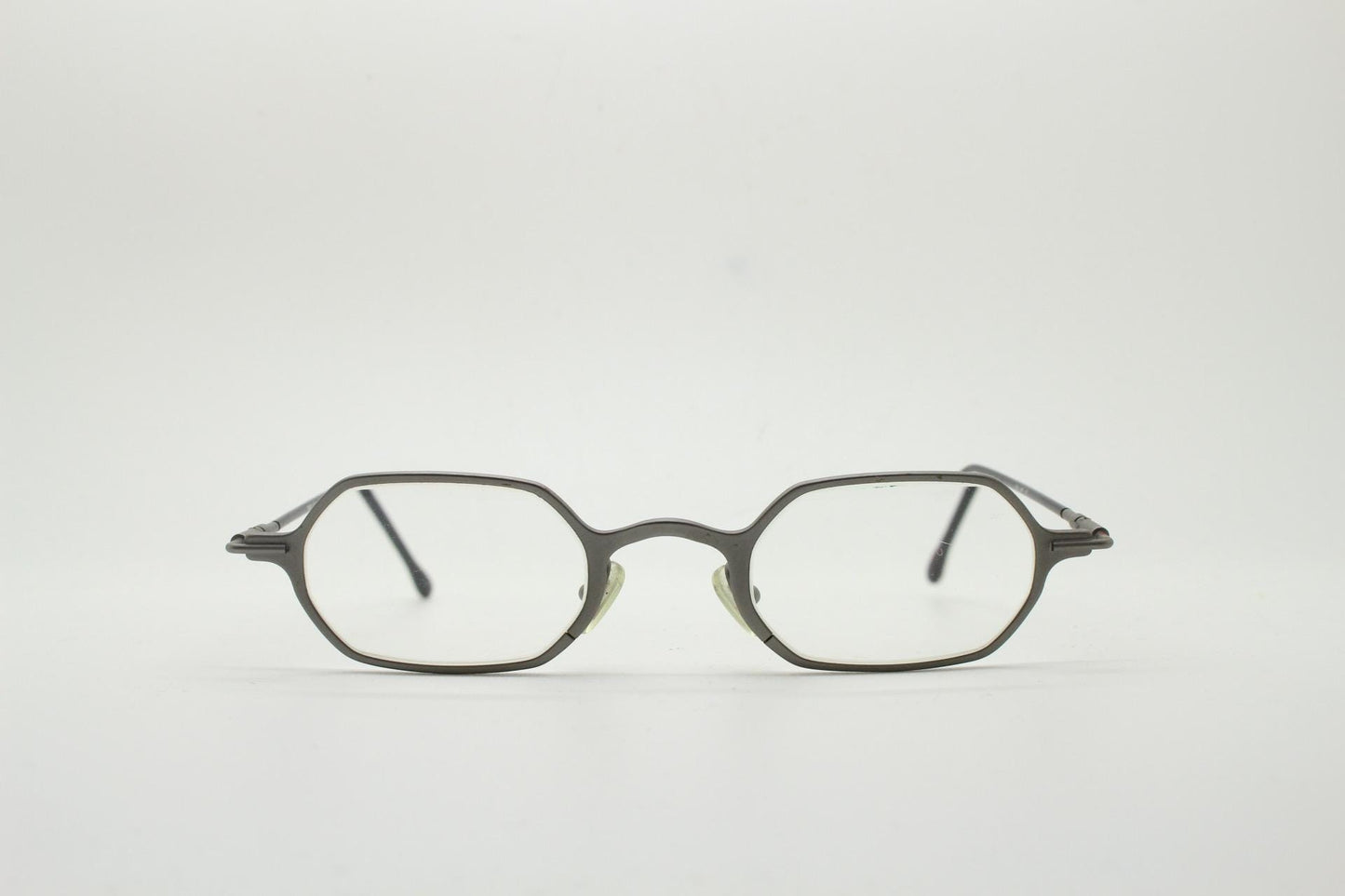 DKNY 90s vintage hexagon eye glasses made in Italy. Small matt grey optical frames. Prescription RX. Donna Karan. Victorian style steampunk