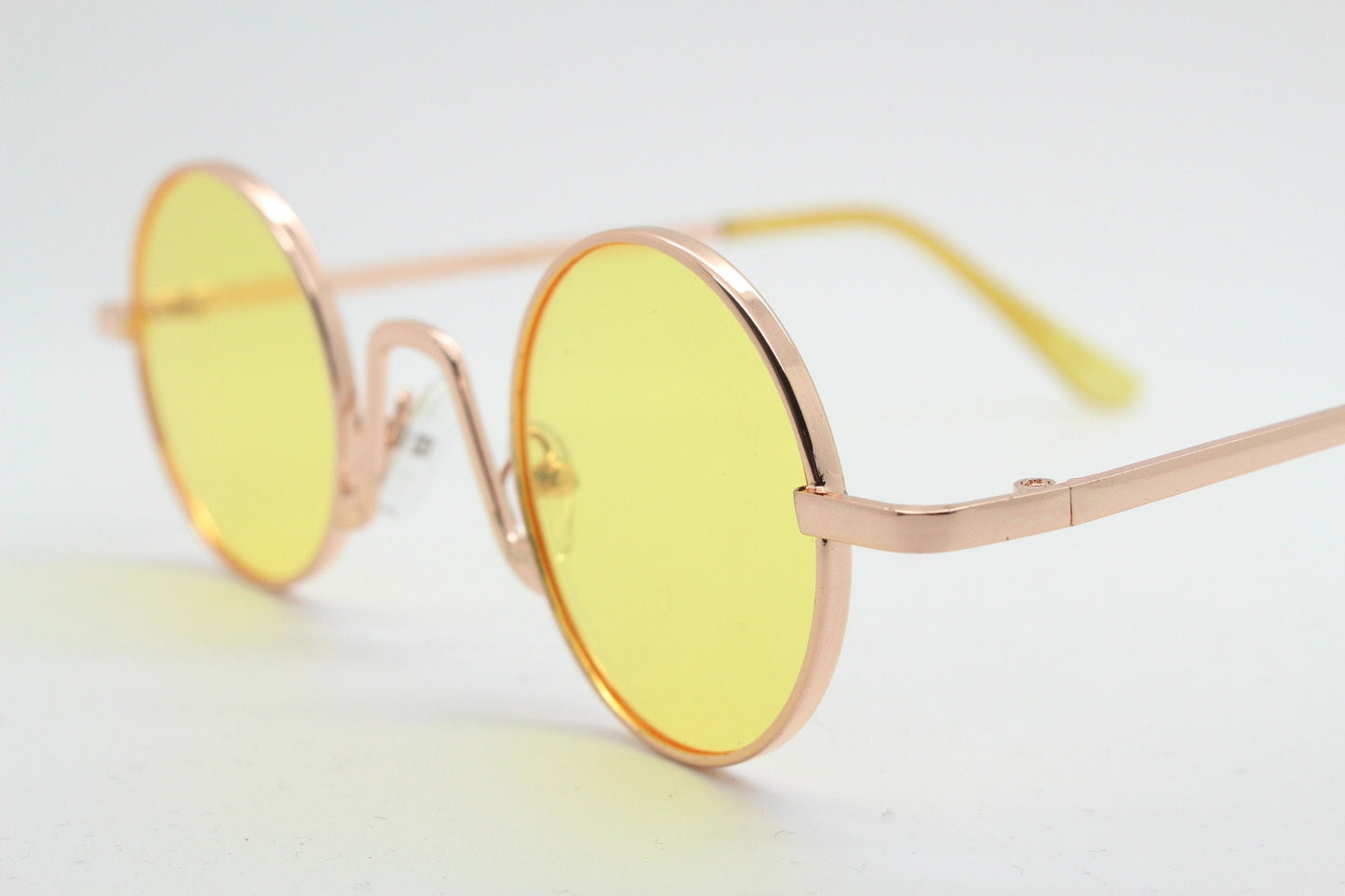 90s vintage small oval sunglasses. Imposing minimal gold victorian style frame with blazing canary yellow lenses. Steampunk. Unused BNWT