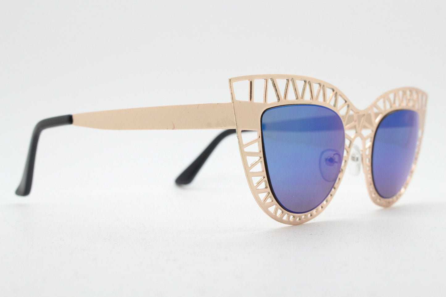 Y2K vintage metal cat eye sunglasses. Women's extraordinary gold cut out lattice scaffold cateye frame with blue mirror lenses. 2000s. BNWT