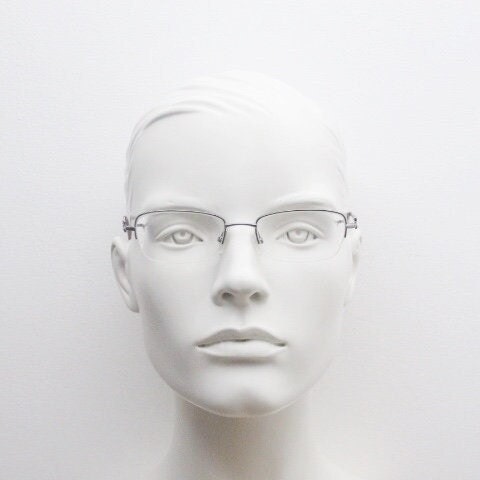 Gucci rectangular eye glasses made in Italy. Slim metal wire low profile optical half frame with diamante logo. Prescription eyeglasses. RX