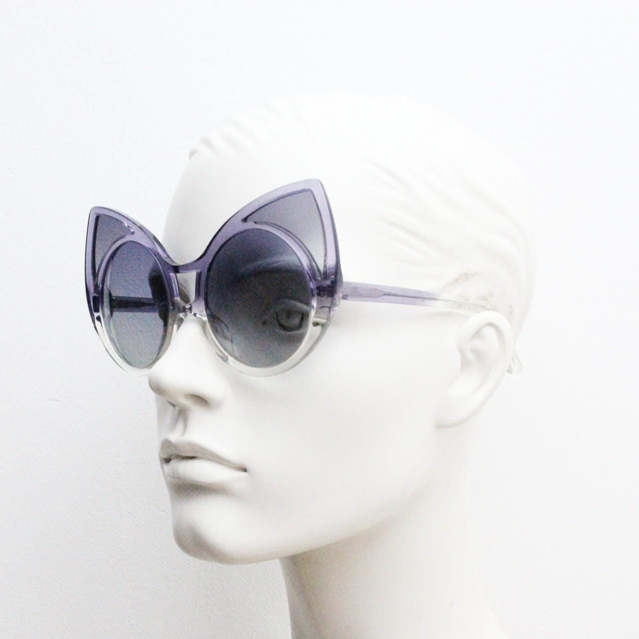 Linda Farrow huge cat eye sunglasses. Purple version of the true original that caused a million copies. Khaleda + Fahad Projects Vintage NOS