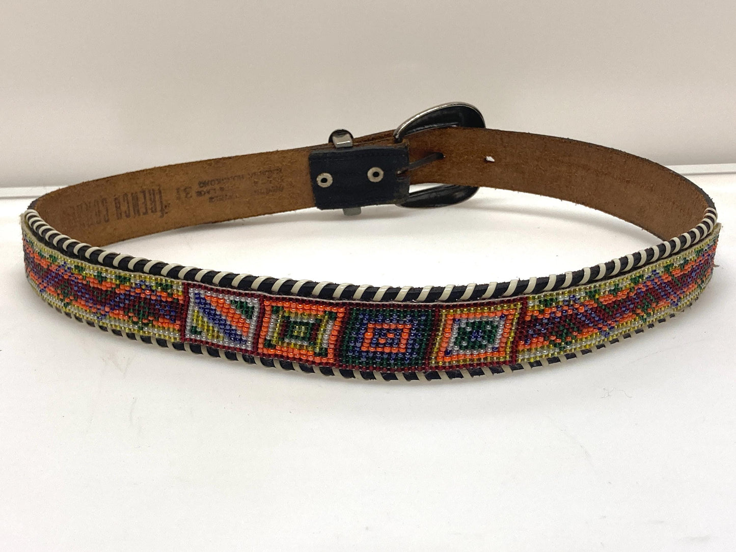 80s vintage thick Leather Native American Indian style belt. Full beaded applique, looped tape edge, embossed pattern and textured buckle