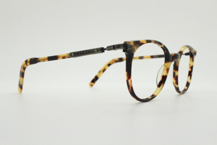 Sting 90s vintage round eye glasses made in Italy. Honey tortoise acetate optical frames. 40s retro design. Prescription eyeglasses. RX