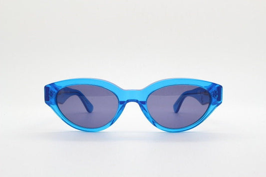 Retrosuperfuture thick cat eye sunglasses hand made in Italy. Intense blue acetate chunky frame with tasteful navy lenses. NOS