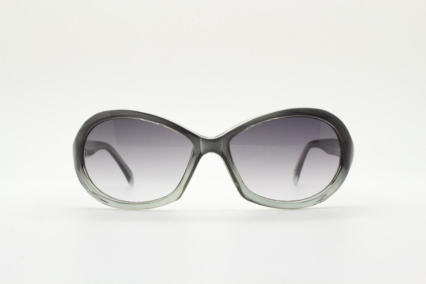 Y2K vintage oval bug eye sunglasses. Tasteful transparent grey acetate frame with matching graduated lenses. 2000s NOS. BNWT