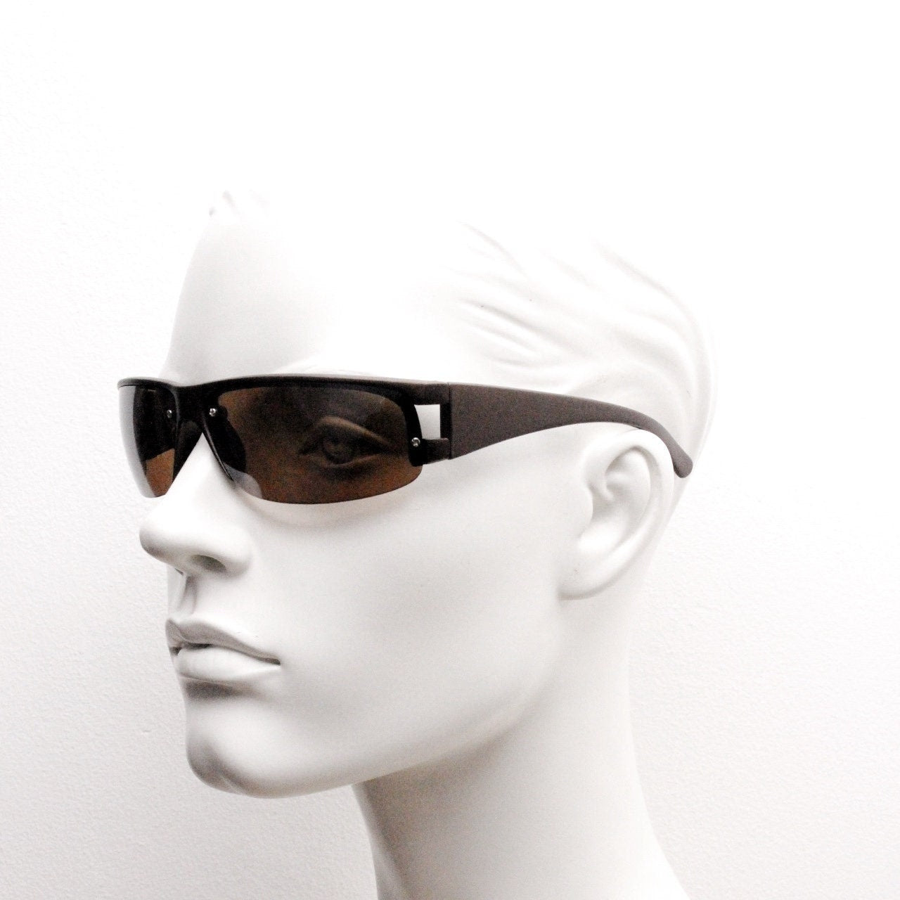 90s vintage visor sunglasses. Brown matt half frame wrap around sports shield with light tone lenses. Mini mask. 2000's. Y2K NOS