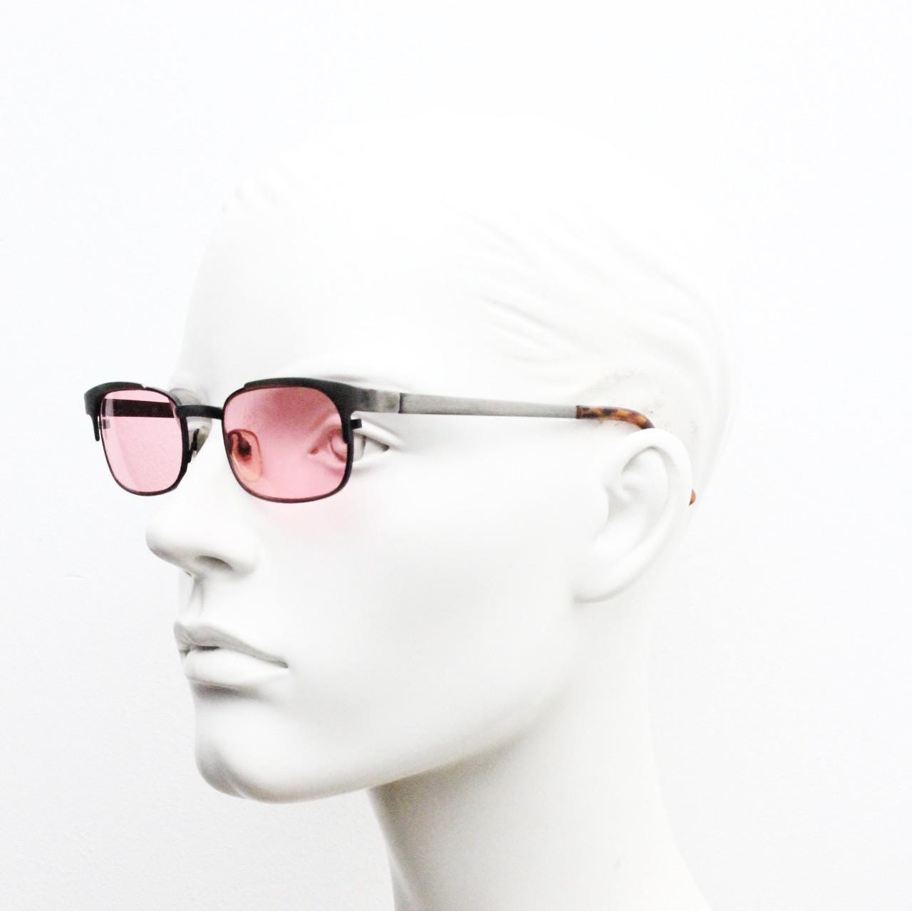 90s vintage rectangular sunglasses with bright pink lenses. Solid metal low profile frame in a brushed bronze finish. Y2K. NOS
