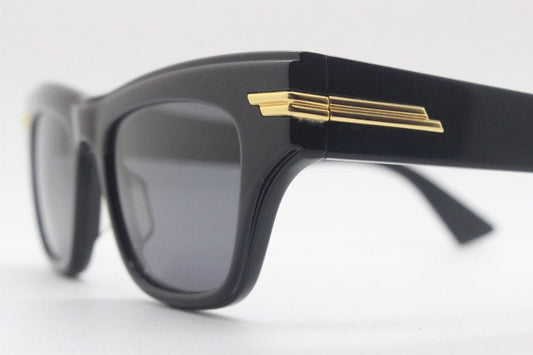 Bottega Veneta thick flat top cat eye sunglasses made in Japan. Black gloss acetate frame with sharp cropped sides. Womens cateye. BNWOT
