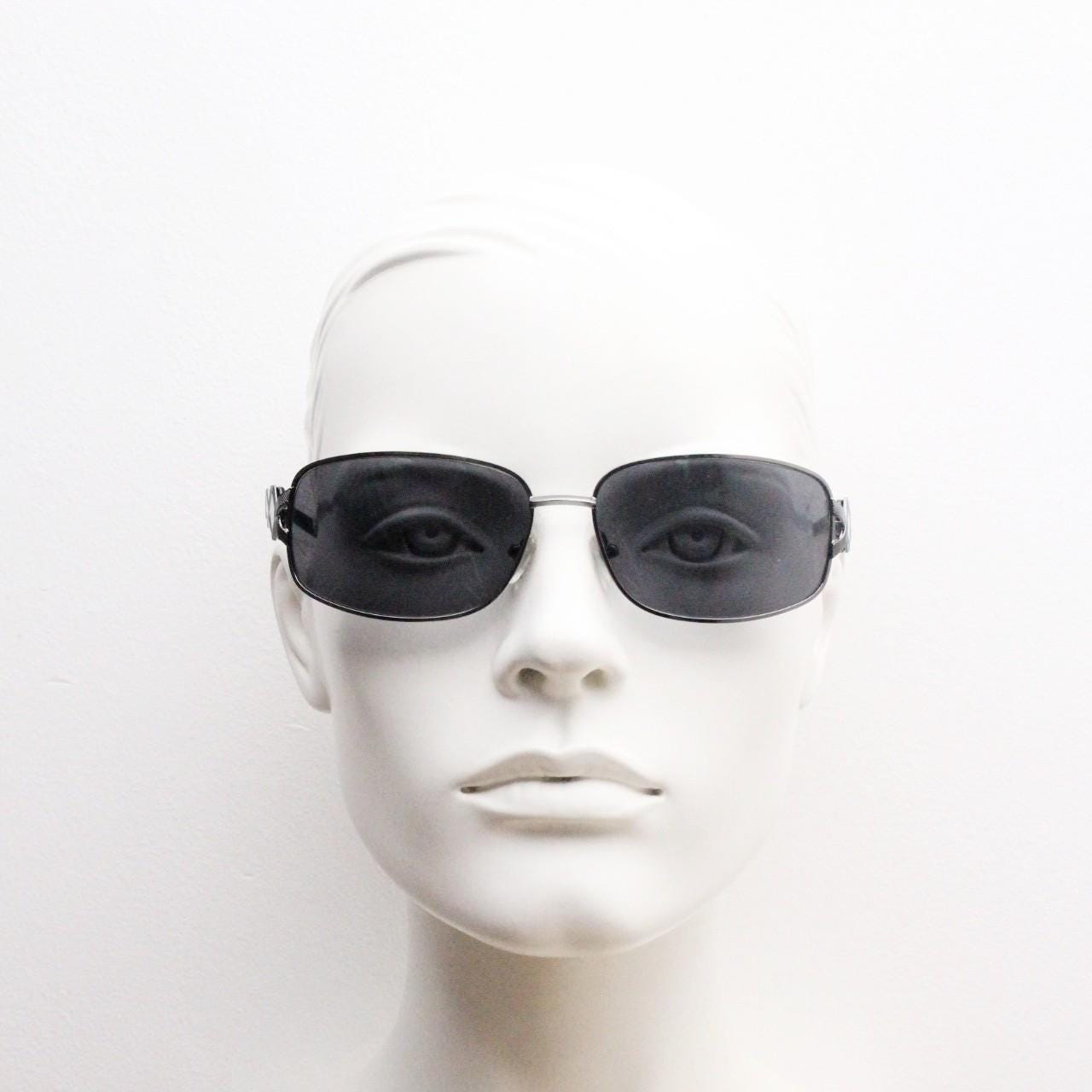 2000s vintage rectangular bug eye sunglasses. Solid metal slightly oversized grey chrome frame with diamond lattice arm detail. Y2K NOS